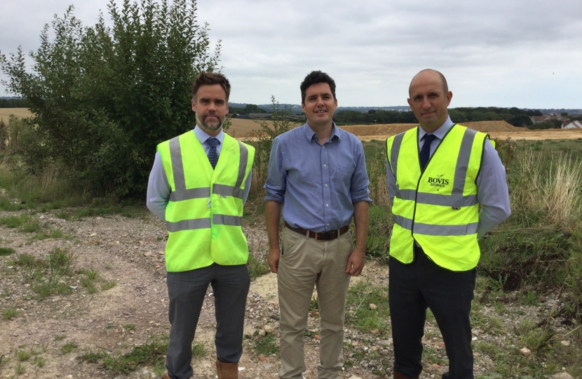 From left, Doug Law, Bovis Homes’ regional land director; Bexhill MP Huw Merriman; and Matt Charnock, Bovis Homes’ strategic development director, on the north Bexhill location