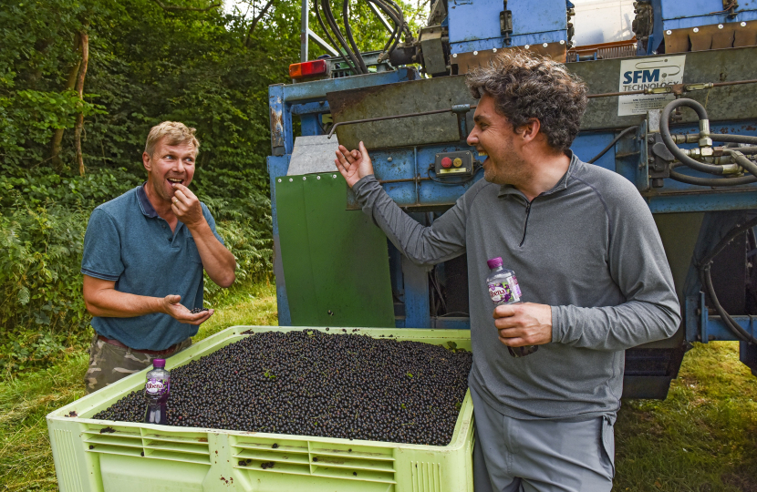 Huw talking to farmer Michael Reeves