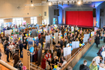 Photo taken at Bexhill Jobs Fair of room full of people having conversations