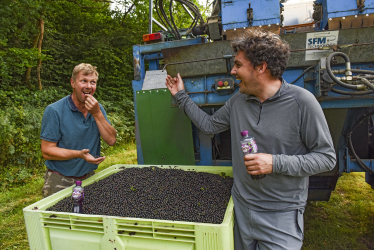 Huw talking to farmer Michael Reeves