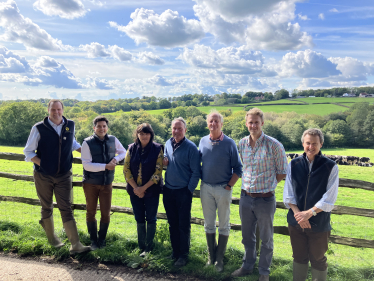 Huw on Ashburnam farm with local farmers