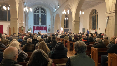 Photo of public meeting on Northeye from rear of church